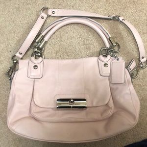 Coach bag with detachable shoulder strap.